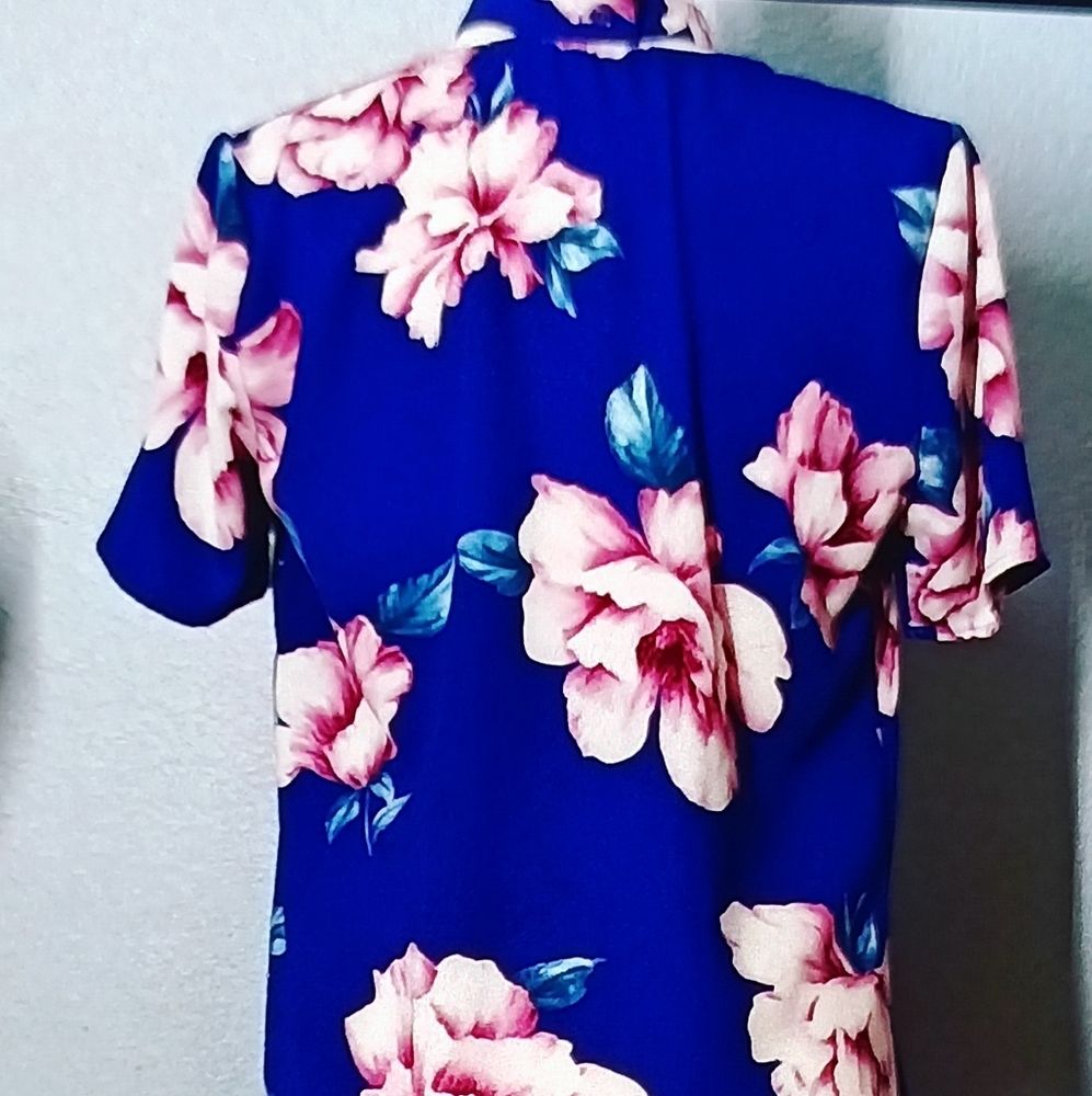 Floral knee length dress.
